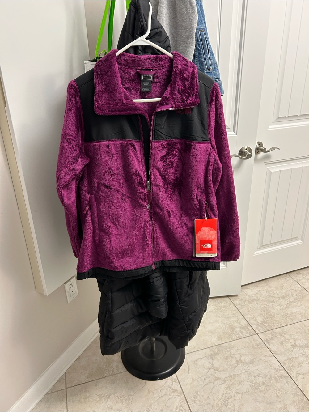 The North Face Girl’s Purple Teddy Fleece Jacket with Black Yoke. XL.